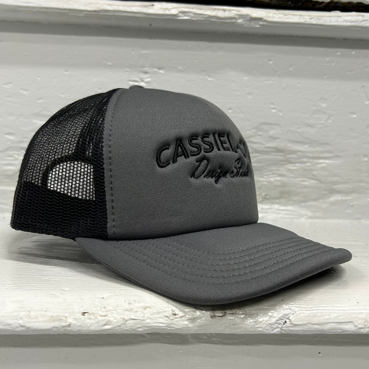 Cassiel Clo Arch Logo Grey Foam Trucker Cap